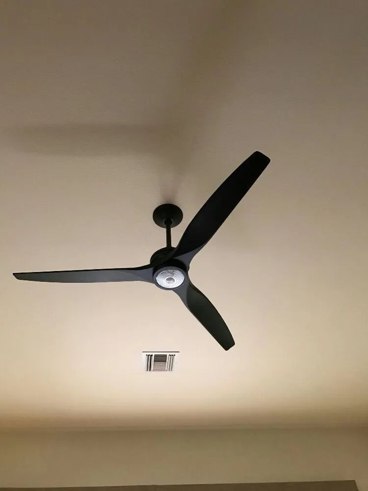 Ceiling fan installed for trade-wind cooling in an Aiea, HI home